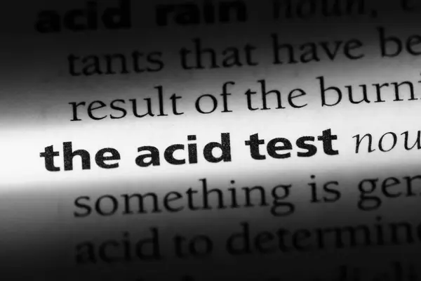 the acid test word in a dictionary. the acid test concept.