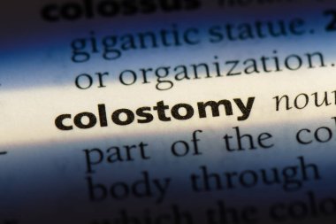 colostomy word in a dictionary. colostomy concept clipart