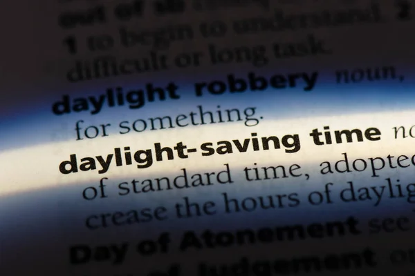 daylight saving time word in a dictionary. daylight saving time concept