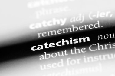 catechism word in a dictionary. catechism concept clipart