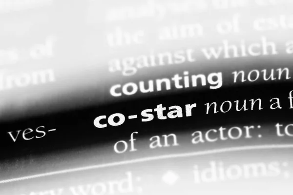 co-star word in a dictionary. co-star concept