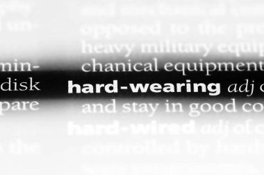 sert bir sözlükte kelime giyiyor. zor giyen kavramı.