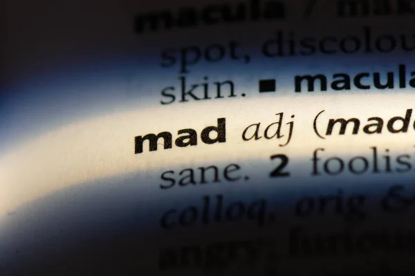 mad word in a dictionary. mad concept.