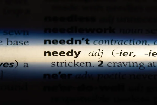 Potrzebujących Słowo Słowniku Koncepcja Potrzebujących — Zdjęcie stockowe