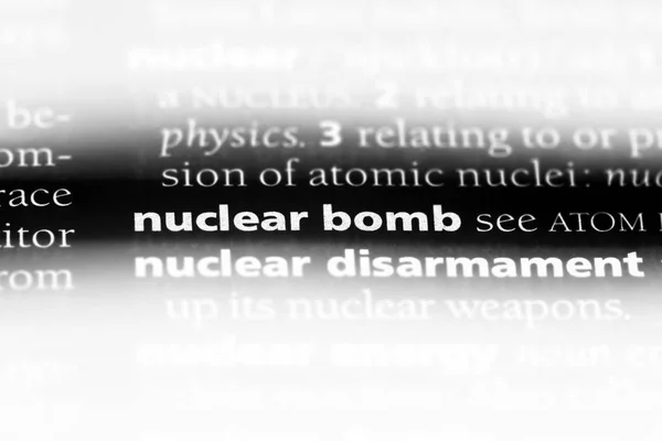 nuclear bomb word in a dictionary. nuclear bomb concept.