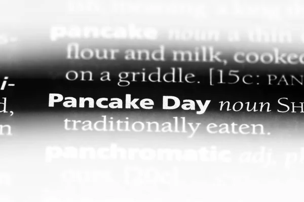 pancake day word in a dictionary. pancake day concept.