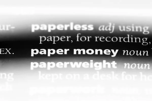 paper money word in a dictionary. paper money concept.