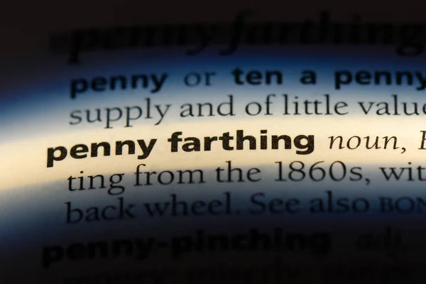 penny farthing word in a dictionary. penny farthing concept.
