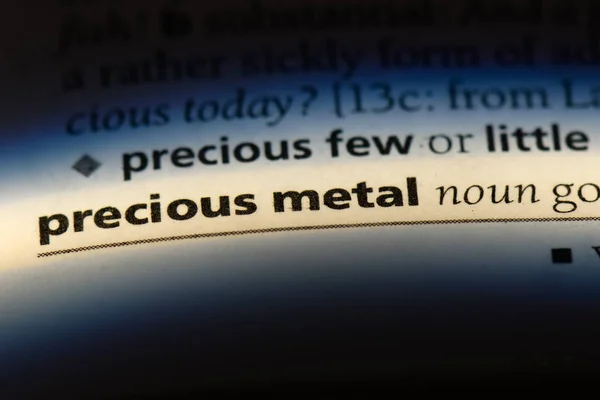 precious metal word in a dictionary. precious metal concept.