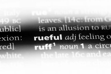 rueful tek kelimeyle bir sözlük. rueful kavramı.