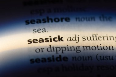seasick word in a dictionary. seasick concept. clipart