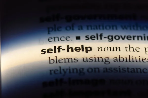 self help word in a dictionary. self help concept.