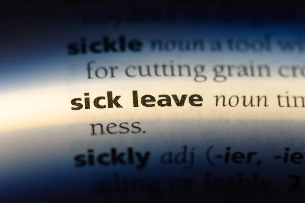 sick leave word in a dictionary. sick leave concept.