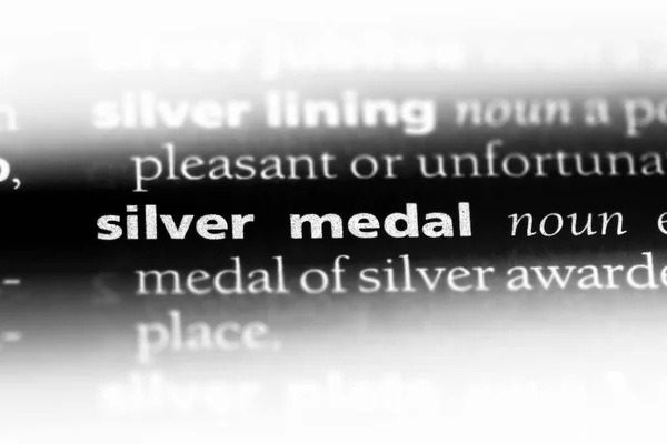 silver medal word in a dictionary. silver medal concept.