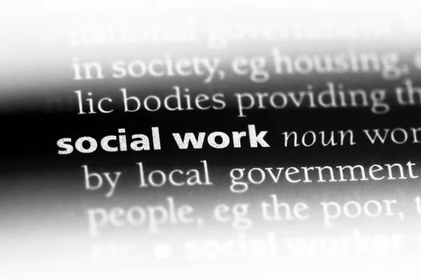 social work word in a dictionary. social work concept.