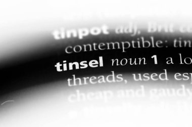 bir sözlüğü'ndeki sözcüğü tinsel. tinsel kavramı.