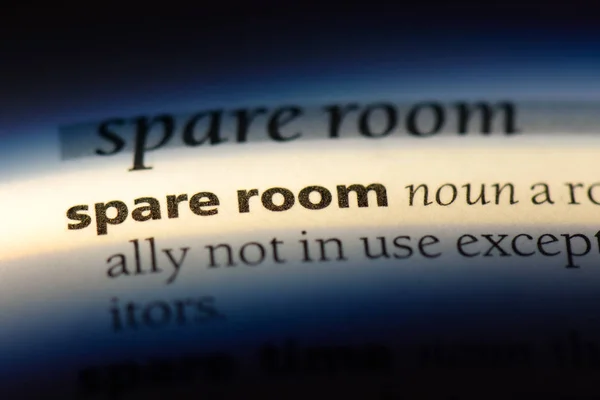 spare room word in a dictionary. spare room concept.