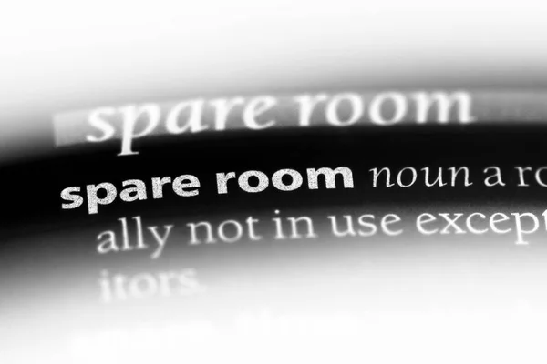 spare room word in a dictionary. spare room concept.