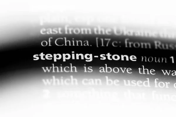 stepping stone word in a dictionary. stepping stone concept.