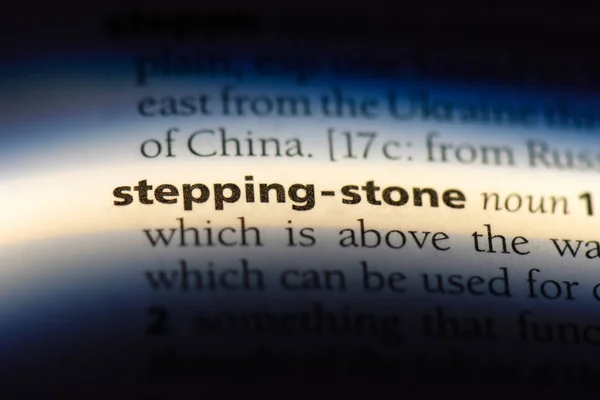 stepping stone word in a dictionary. stepping stone concept.