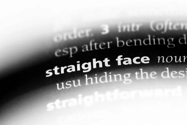 straight face word in a dictionary. straight face concept.