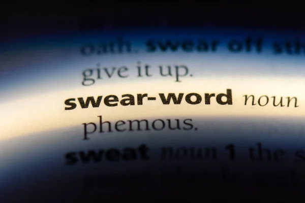 swear word word in a dictionary. swear word concept.