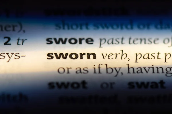 sworn word in a dictionary. sworn concept.