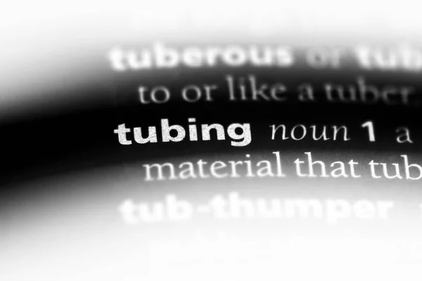 tubing word in a dictionary. tubing concept.