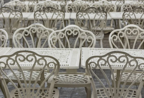 wrought iron tables and chairs