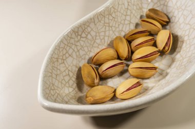 Fıstık fındık kadar kapatın. Çok sayıda sağlık yararları sağlar fındık fıstık olan