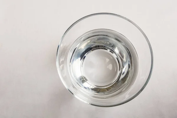 drinkable water in glass cup on table