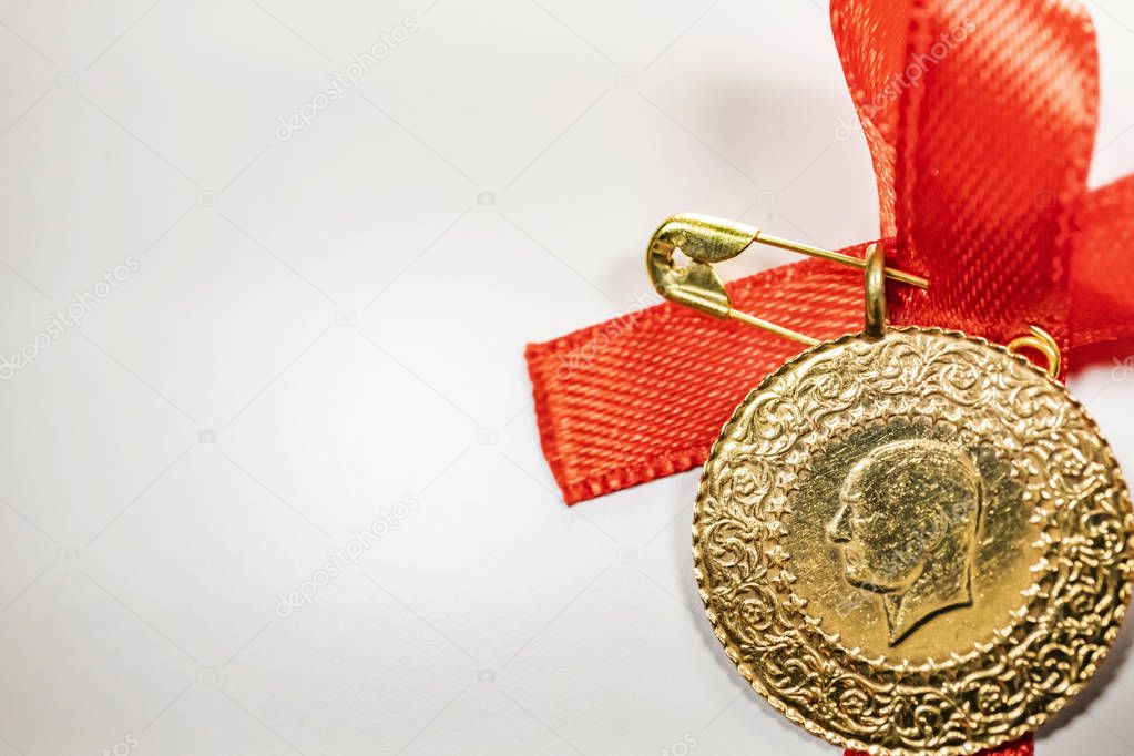 close up half Turkish gold lira on the white background