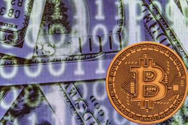 cyripto para madenciliği. dolar ve matris kodları arka plan ile fiziksel Bitcoin sikke yakın