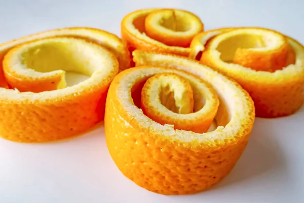 stock image decorative orange peels on white plate