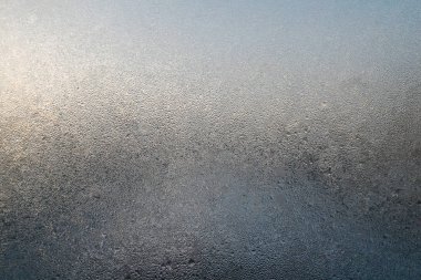 Pencere cam buz arka plan ile