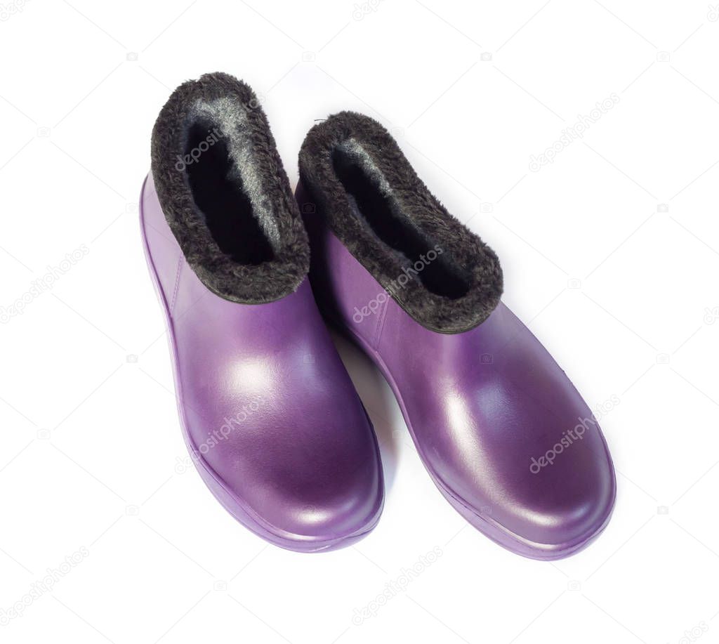 Purple rubber insulated galoshes isolated on white background 