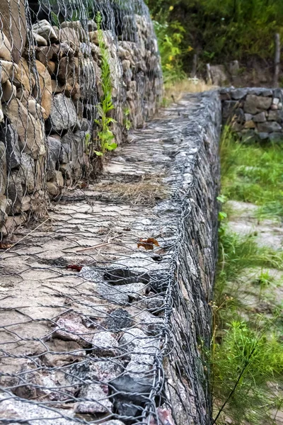 Gabion wall - stones in wire mesh used for erosion control — Stock Photo, Image