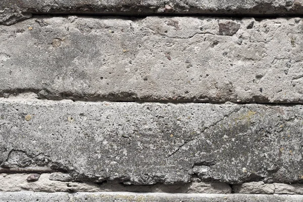 Vieux blocs de béton mur fond gros plan — Photo