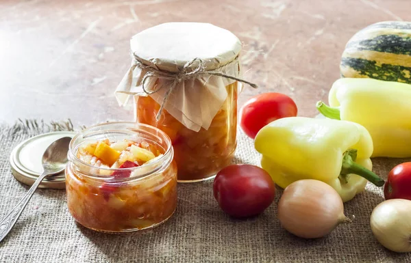 Homemade preserving. Zucchini and bell pepper salad in glass jar — Stock Photo, Image