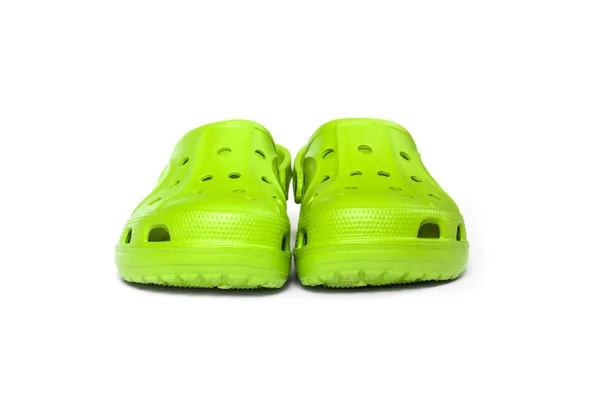 Bright green clogs isolated on white background — Stock Photo, Image