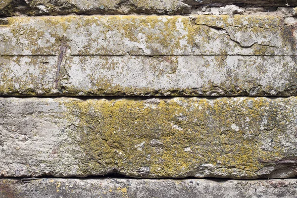 Old concrete blocks wall background closeup — Stock Photo, Image