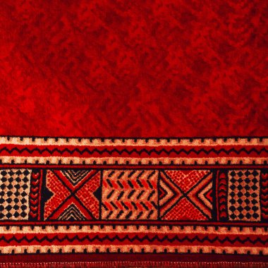 Halı. Kırmızı renk. Geometri. arkaplan ve doku