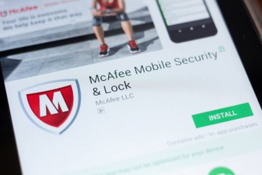 Ryazan, Russia - June 24, 2018: McAfee Mobile Security and Lock mobile app on the display of tablet PC clipart