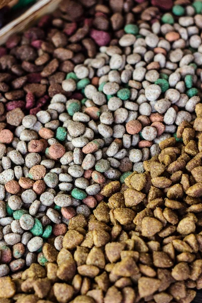 Dry pet food background - three kinds. Meat.