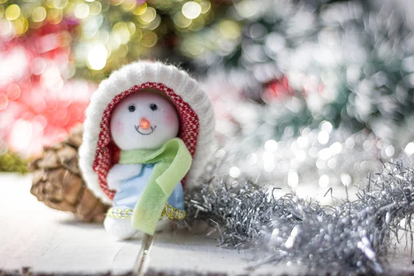 Christmas symbol - happy snowman in a red hat