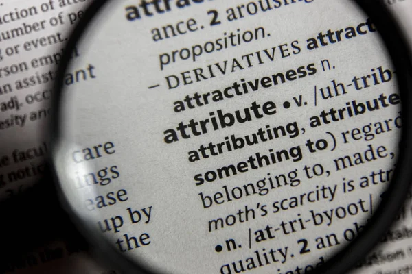 O atributo palavra ou frase em um dicionário . — Fotografia de Stock
