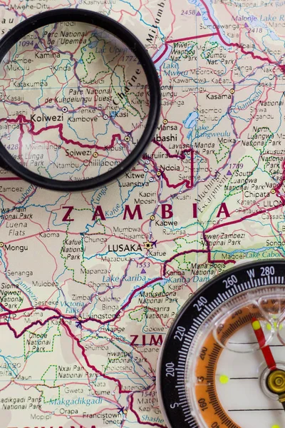 Zambia on the map of the world or atlas.