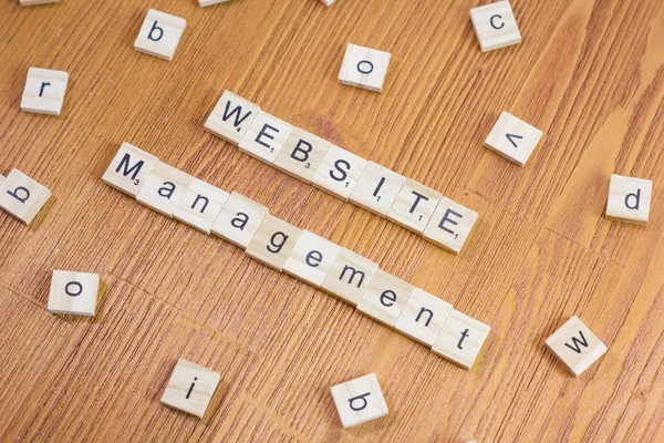 Word or phrase Website Management made with scrabble letters, great image for your needs.