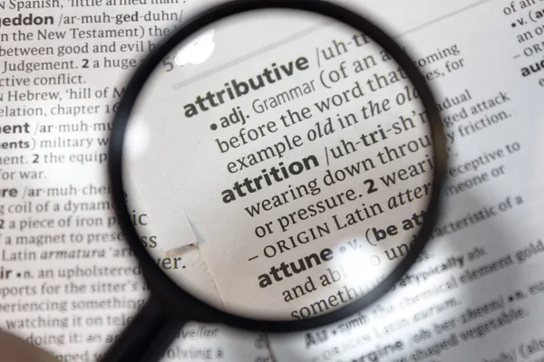 The word of phrase - attrition - in a dictionary. — Stock Photo, Image