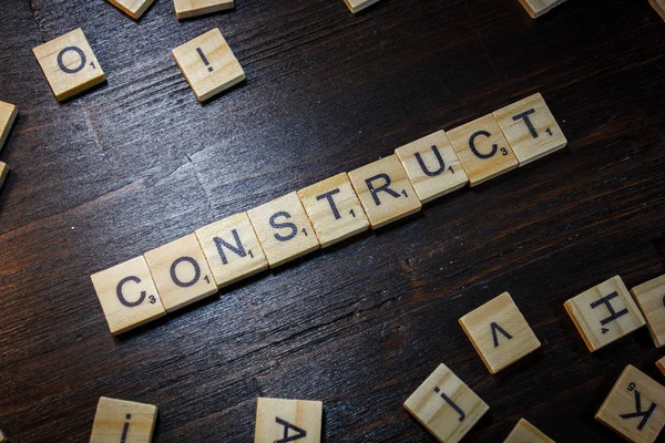 Palavra Frase Construir Feito Com Letras Scrabble Mesa Preta — Fotografia de Stock